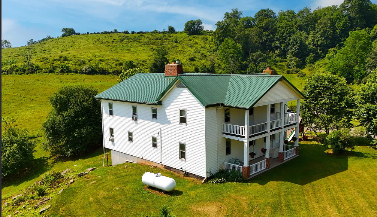Pretty setting! On six acres in West Virginia. $289,000