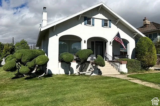 Interesting shrubbery out front! Circa 1915 in Utah. $299,900