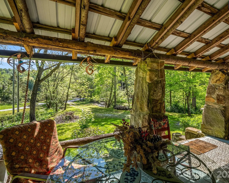 Love stone houses! Pretty creek! Over two acres in North Carolina. $325,000