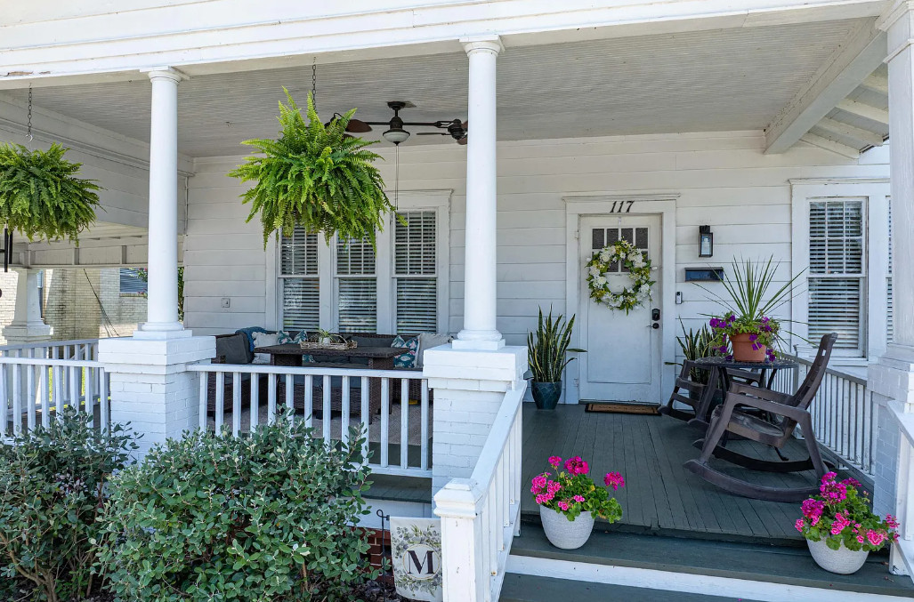 Great porch and a pretty interior! Circa 1926 in Florida. $275,000