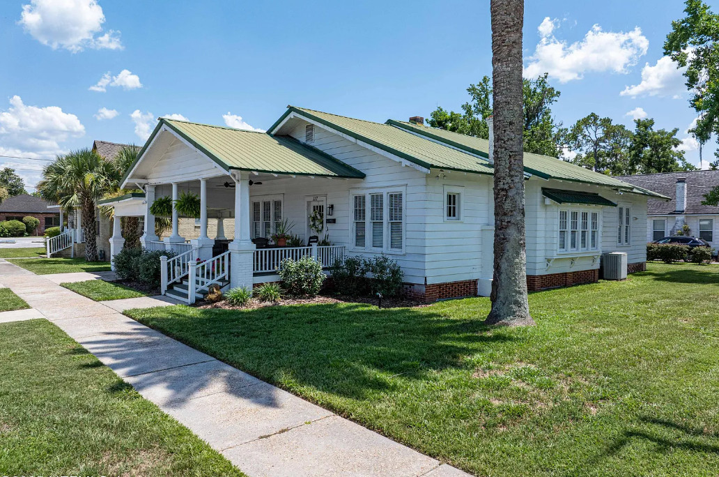 Great porch and a pretty interior! Circa 1926 in Florida. $275,000
