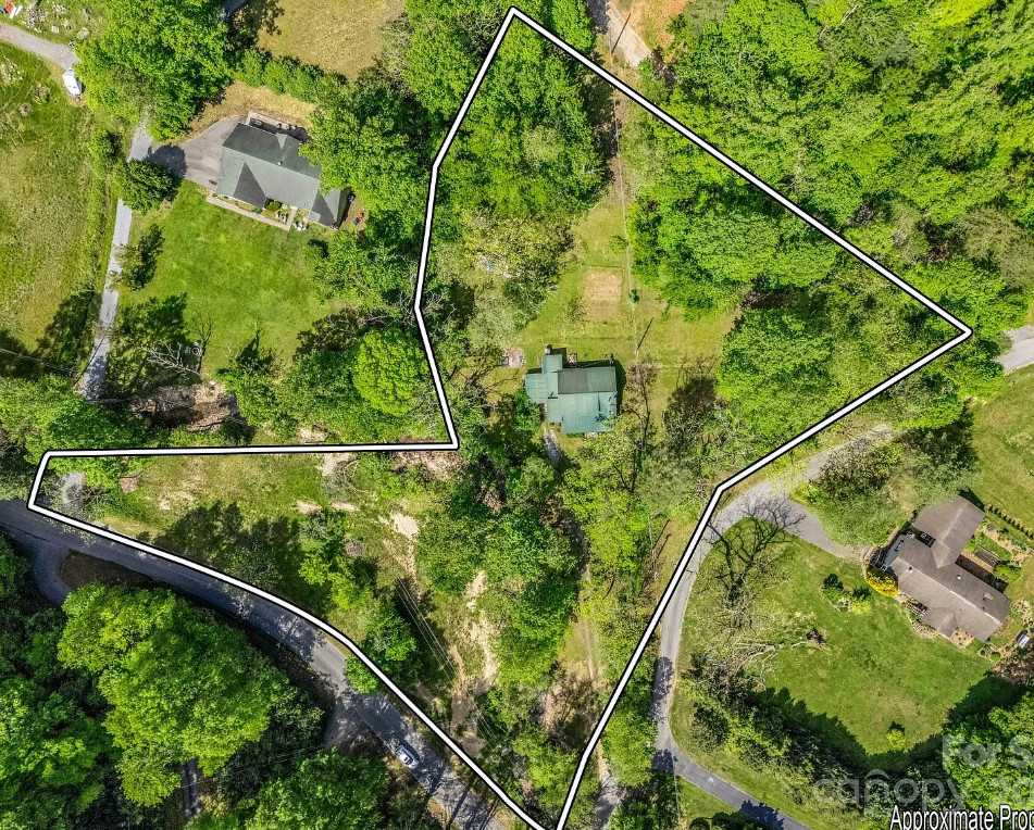 Love stone houses! Pretty creek! Over two acres in North Carolina. $325,000