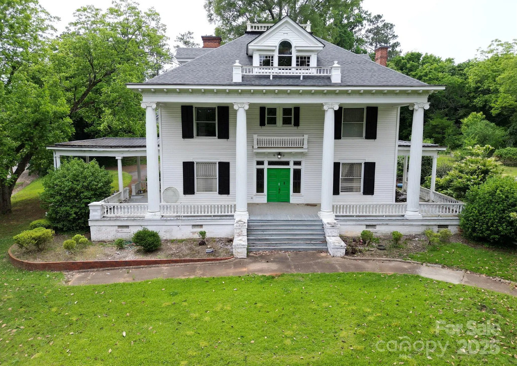 Great staircase and vintage bathrooms! One acre in North Carolina. $450,000