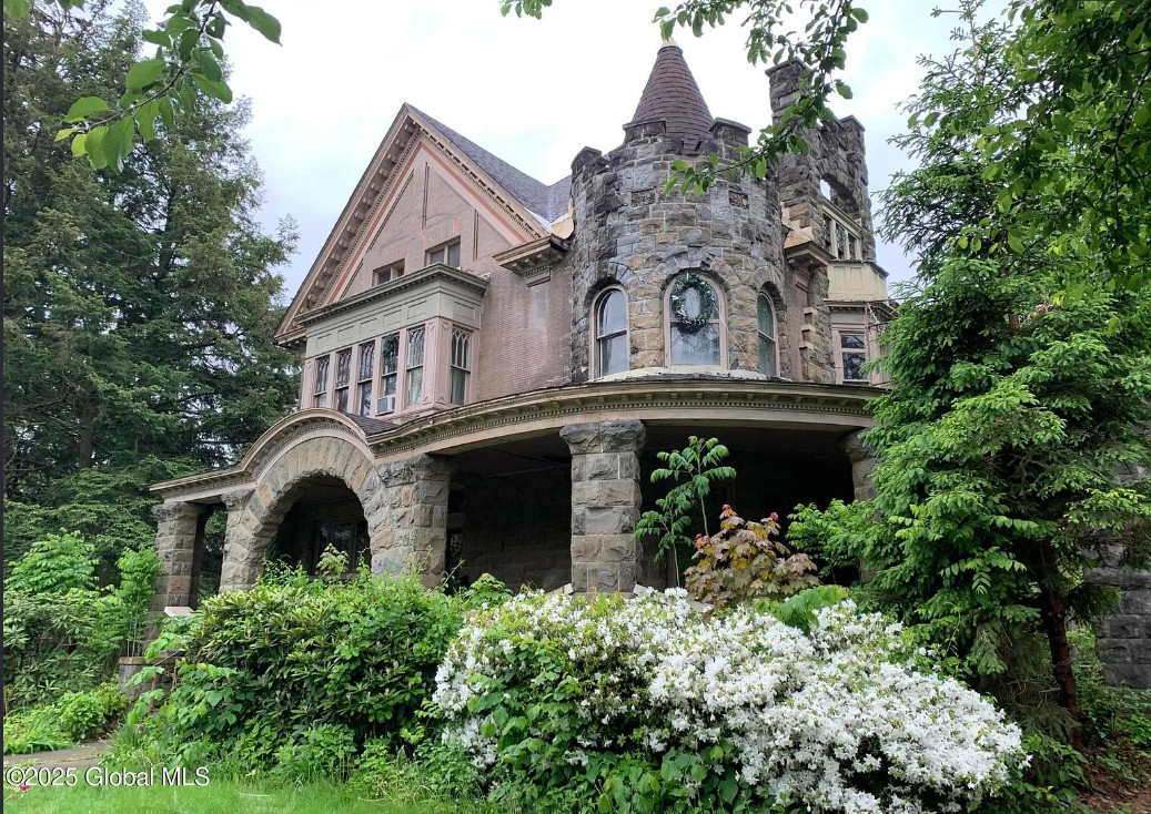 Look at the woodwork and the staircase! Circa 1899 in New York. $485,000