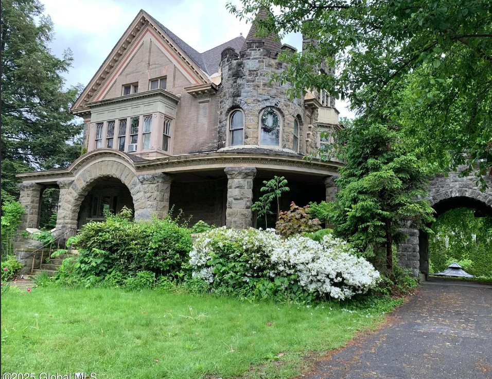 Look at the woodwork and the staircase! Circa 1899 in New York. $485,000
