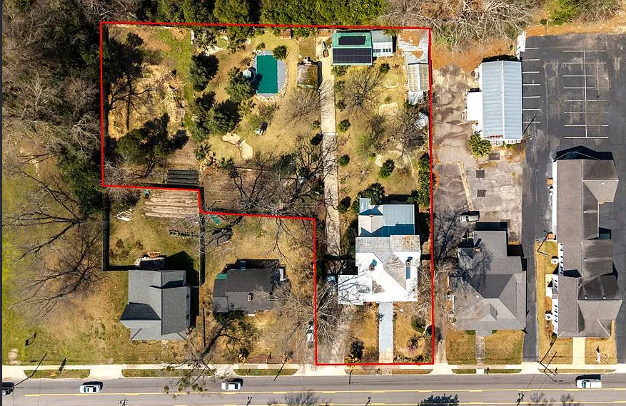 Has a pool, putting greens and a koi pond! C. 1925. Over an acre in SC. $334,500