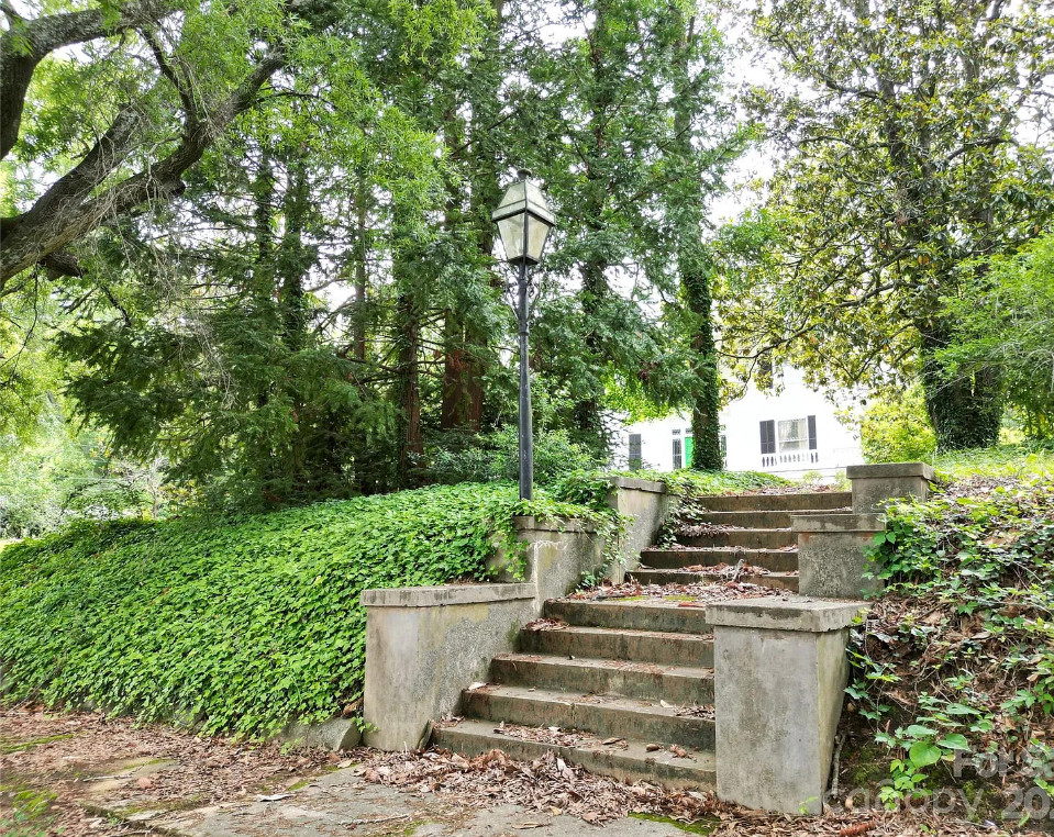 Great staircase and vintage bathrooms! One acre in North Carolina. $450,000