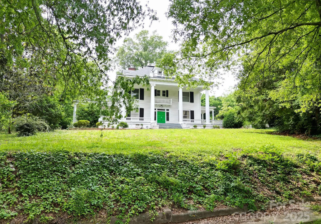 Great staircase and vintage bathrooms! One acre in North Carolina. $450,000