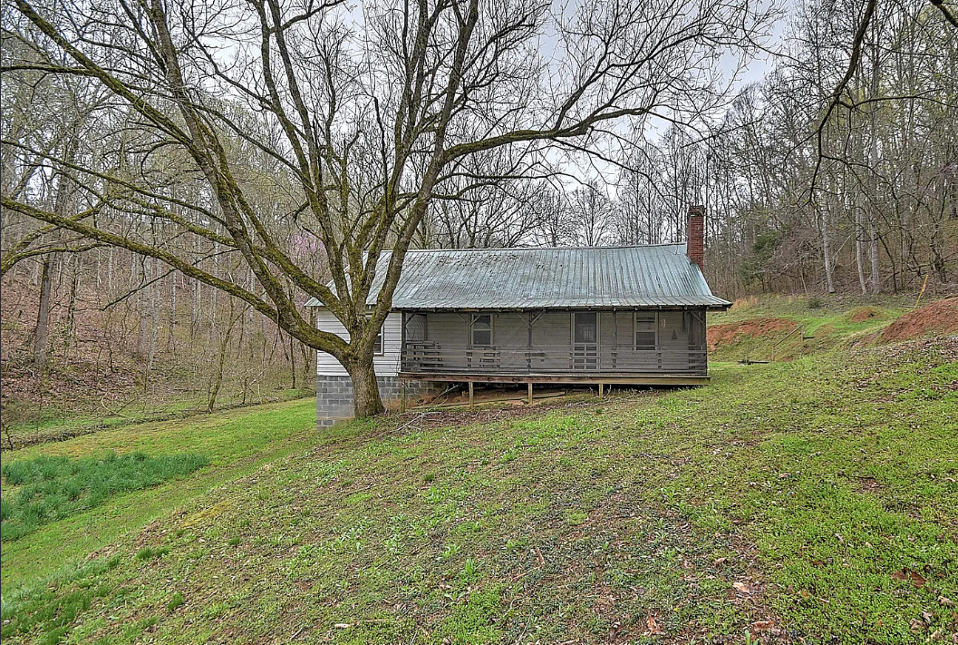 Quite a setting! Two cabins on 49 acres in Tennessee. $325,000