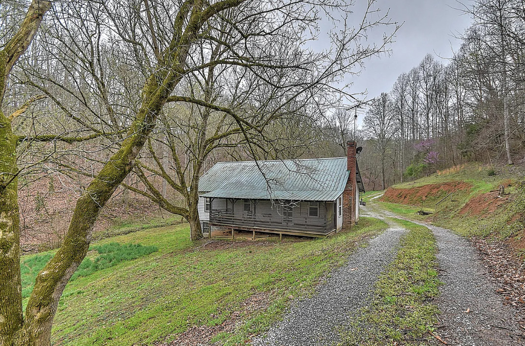 Quite a setting! Two cabins on 49 acres in Tennessee. $325,000
