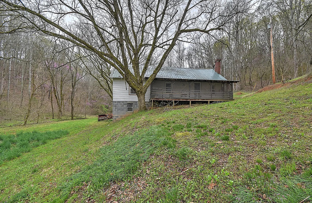 Quite a setting! Two cabins on 49 acres in Tennessee. $325,000