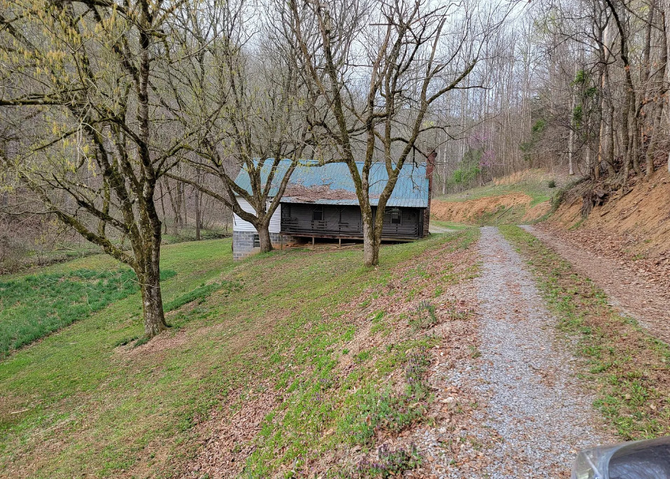 Quite a setting! Two cabins on 49 acres in Tennessee. $325,000