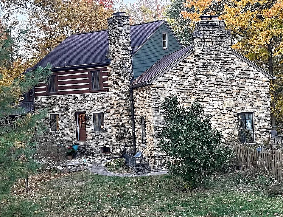 Love the setting and the exterior! Four acres in Indiana. $489,000