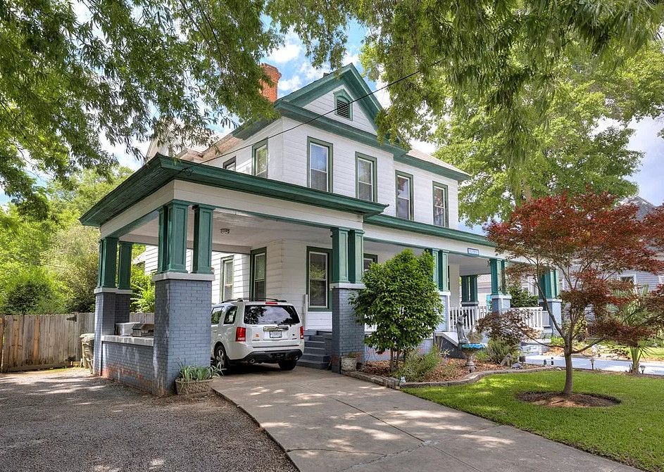 Has a pool, putting greens and a koi pond! C. 1925. Over an acre in SC. $334,500
