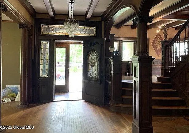 Look at the woodwork and the staircase! Circa 1899 in New York. $485,000