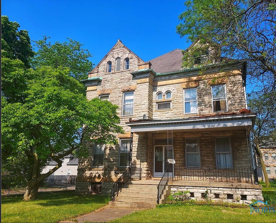 $69,900! Eight bedrooms and four bathrooms! Almost two acres in Ohio.