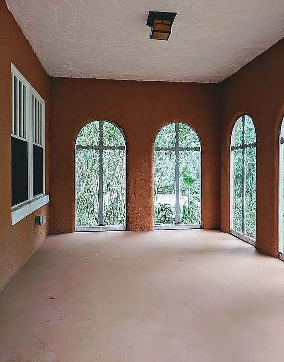 Love that enclosed front porch! Circa 1925 in Florida. $130,000