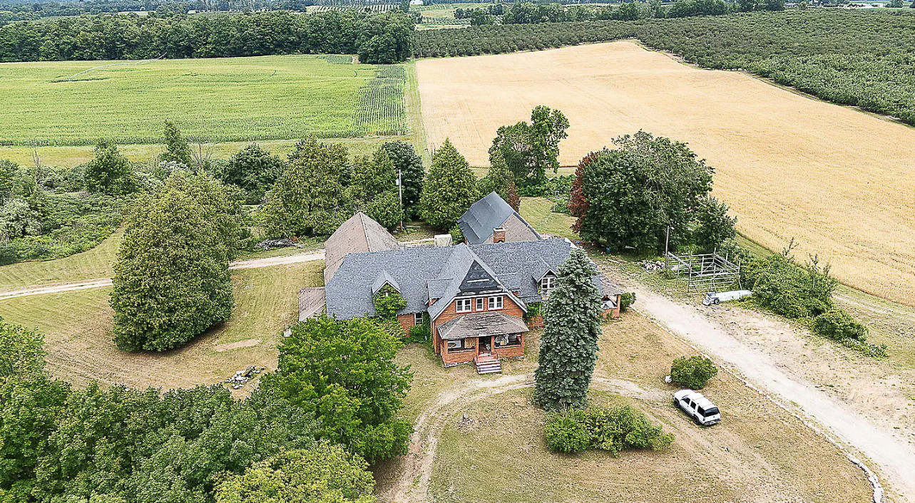Interesting house! 15+ bedrooms! Five acres in Michigan. $349,000
