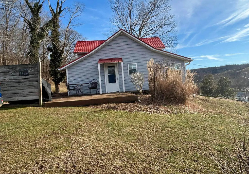 Pretty setting! Loads of potential! Over eight acres in West Virginia. $159,000