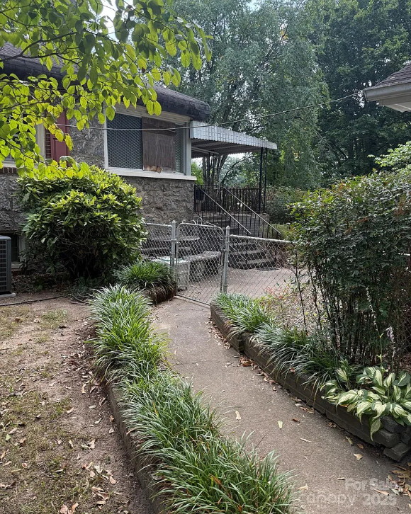 Diamond in the Rough! Love the rolled eaves on the roof! C. 1939 in North Carolina. $199,000