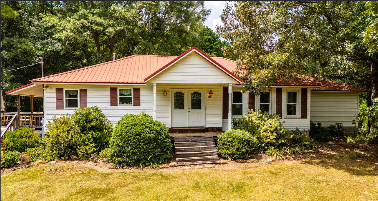 Pretty setting! Love the old barn! On 36 acres in Alabama. $269,000