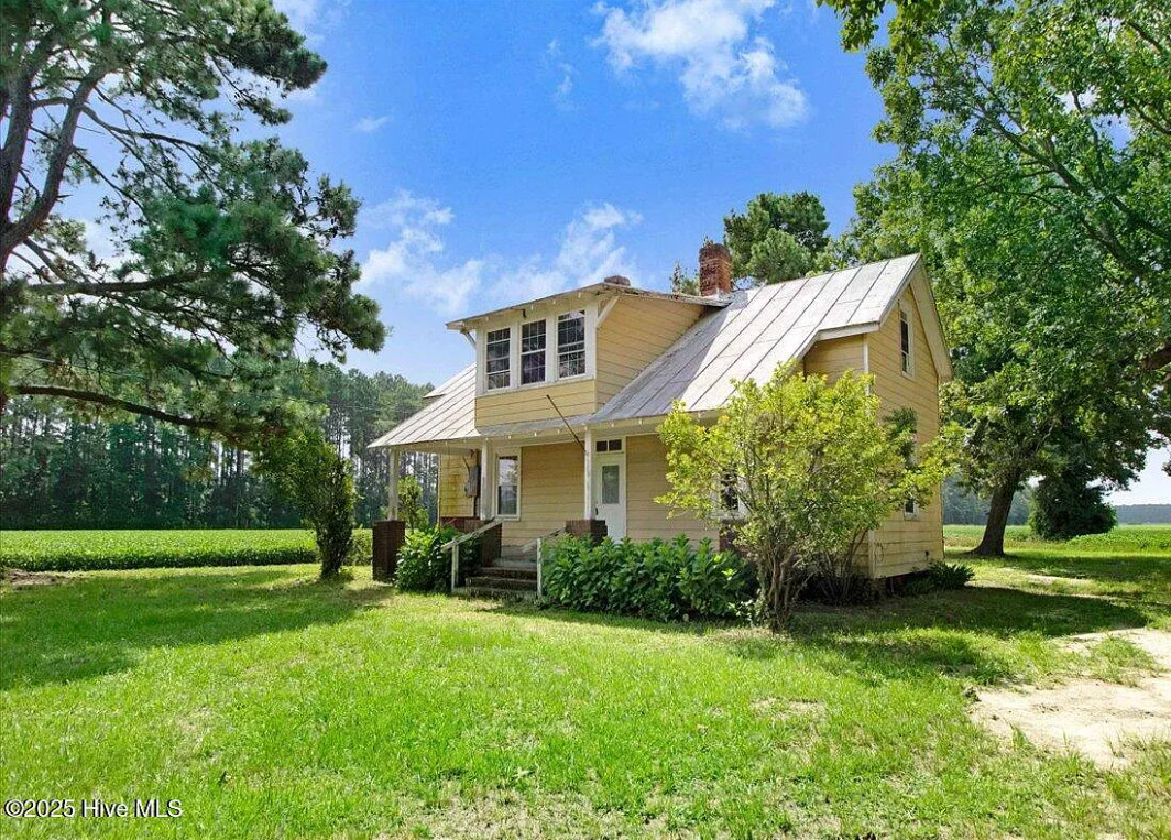 Pecan trees and blueberry bushes! Fixer upper alert on 3 1/2 acres in NC. $125,000