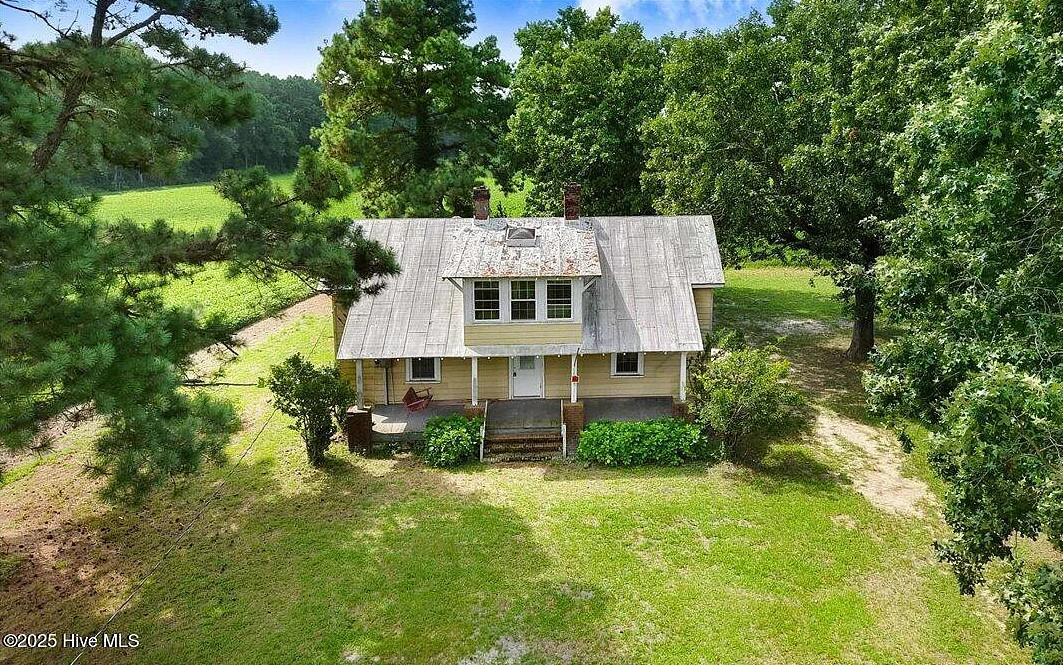 Pecan trees and blueberry bushes! Fixer upper alert on 3 1/2 acres in NC. $125,000