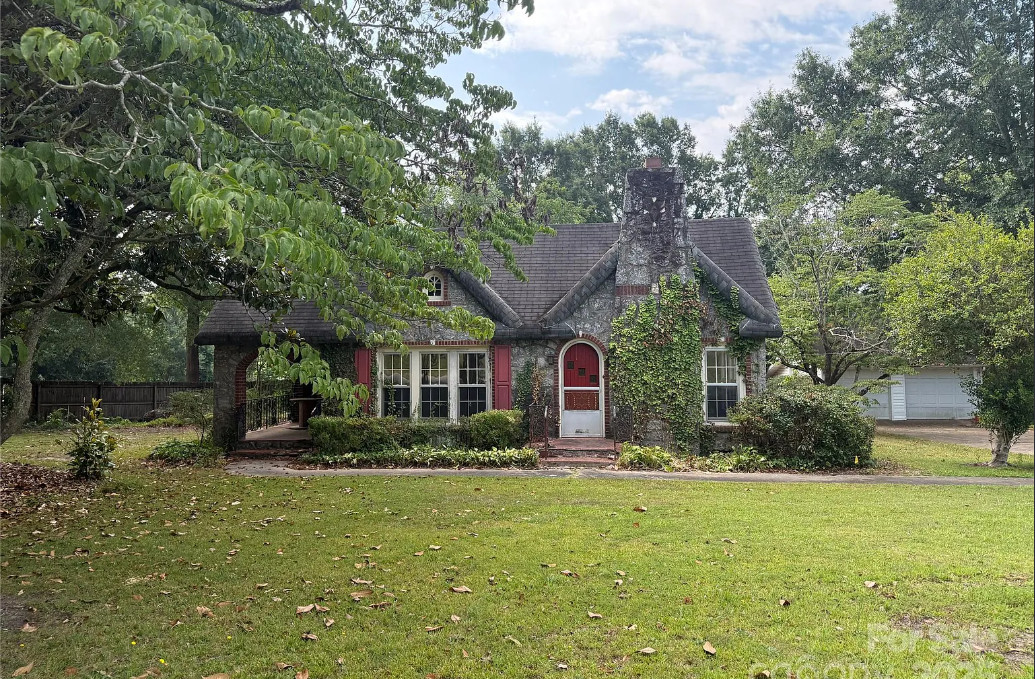 Diamond in the Rough! Love the rolled eaves on the roof! C. 1939 in North Carolina. $199,000