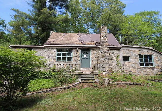 Interesting! Heart shaped fireplace. C. 1935 in Connecticut. $295,000