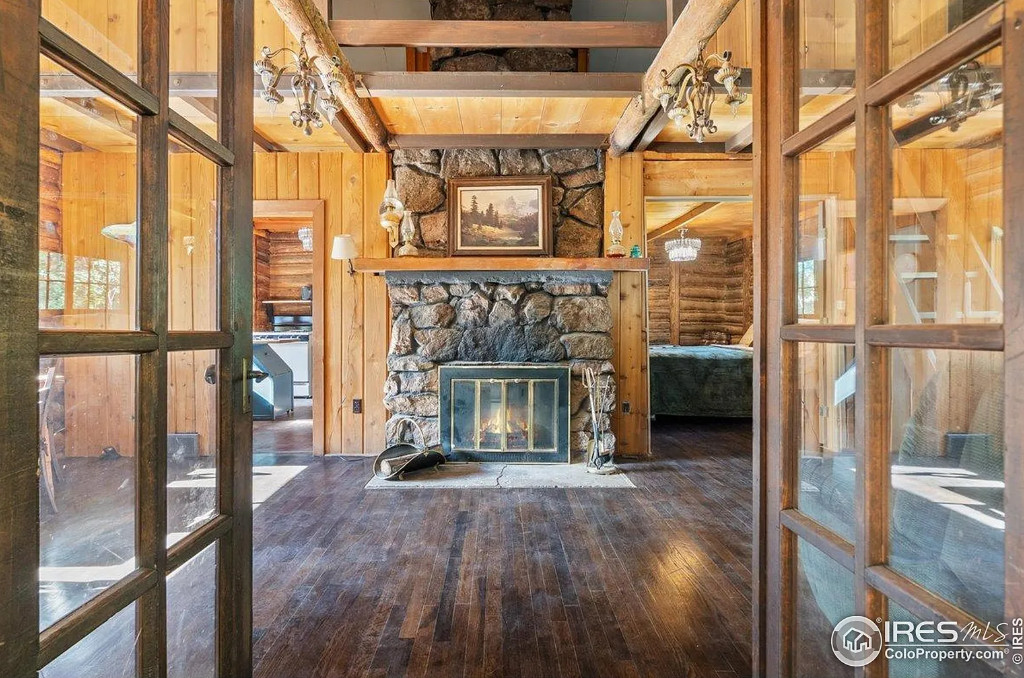 Nice interior! Rustic riverfront cabin in Colorado. $359,500