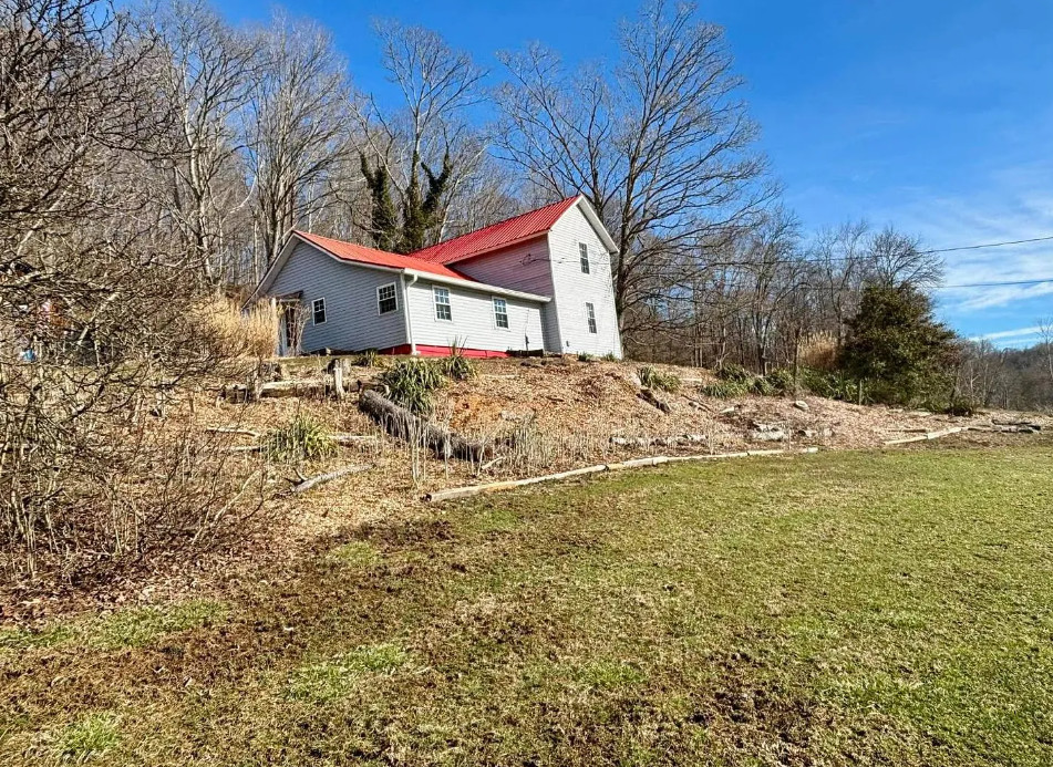 Pretty setting! Loads of potential! Over eight acres in West Virginia. $159,000