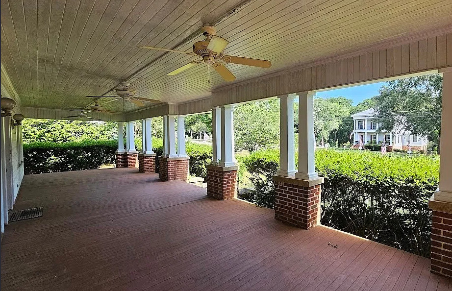 Now that’s a porch! Nice interior! C. 1926 in Alabama. $269,000