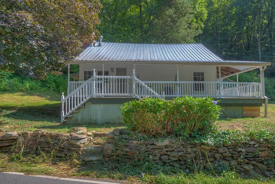 Stocked trout stream! Over seven acres in North Carolina. $185,000