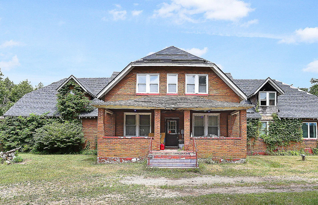 Interesting house! 15+ bedrooms! Five acres in Michigan. $349,000