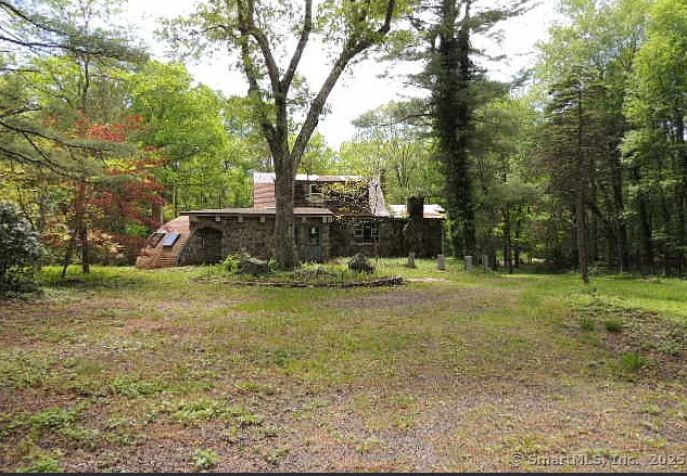 Interesting! Heart shaped fireplace. C. 1935 in Connecticut. $295,000
