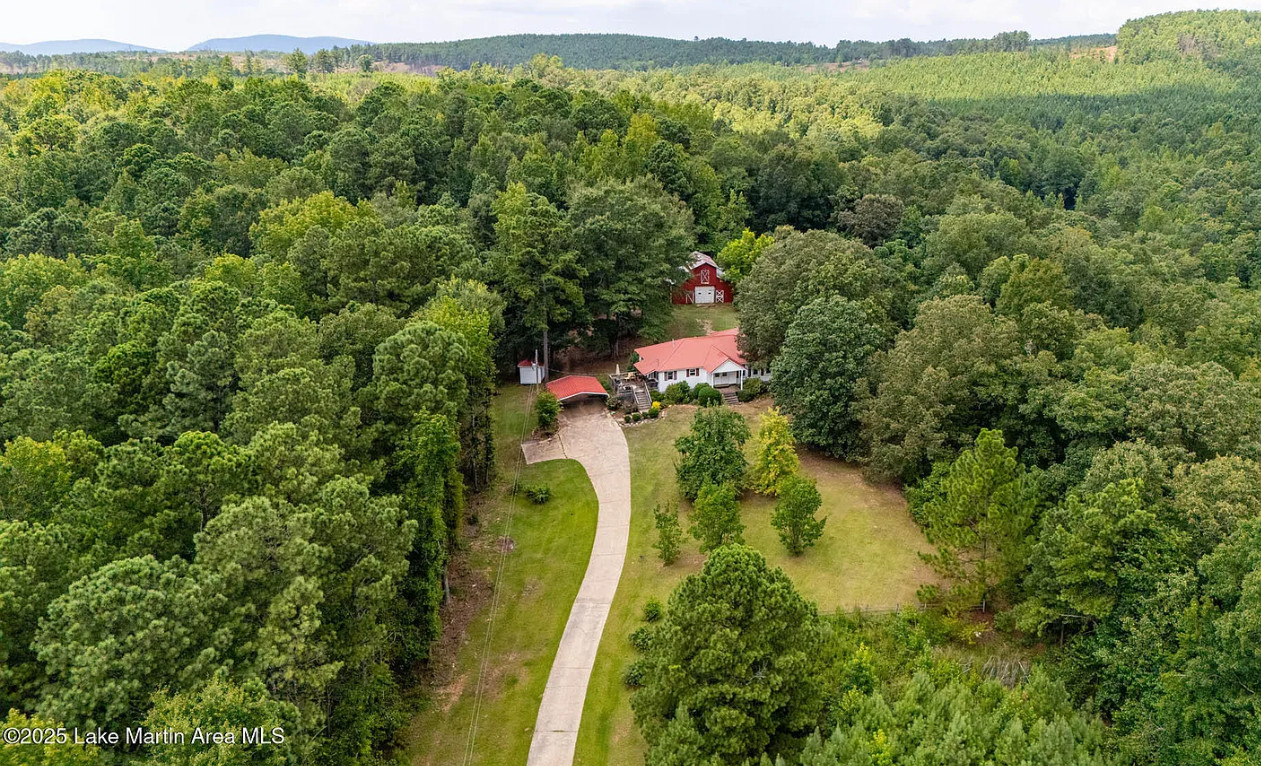 Pretty setting! Love the old barn! On 36 acres in Alabama. $269,000