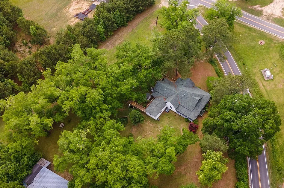 On 18 acres in North Carolina! Love the stained glass front door! $230,000