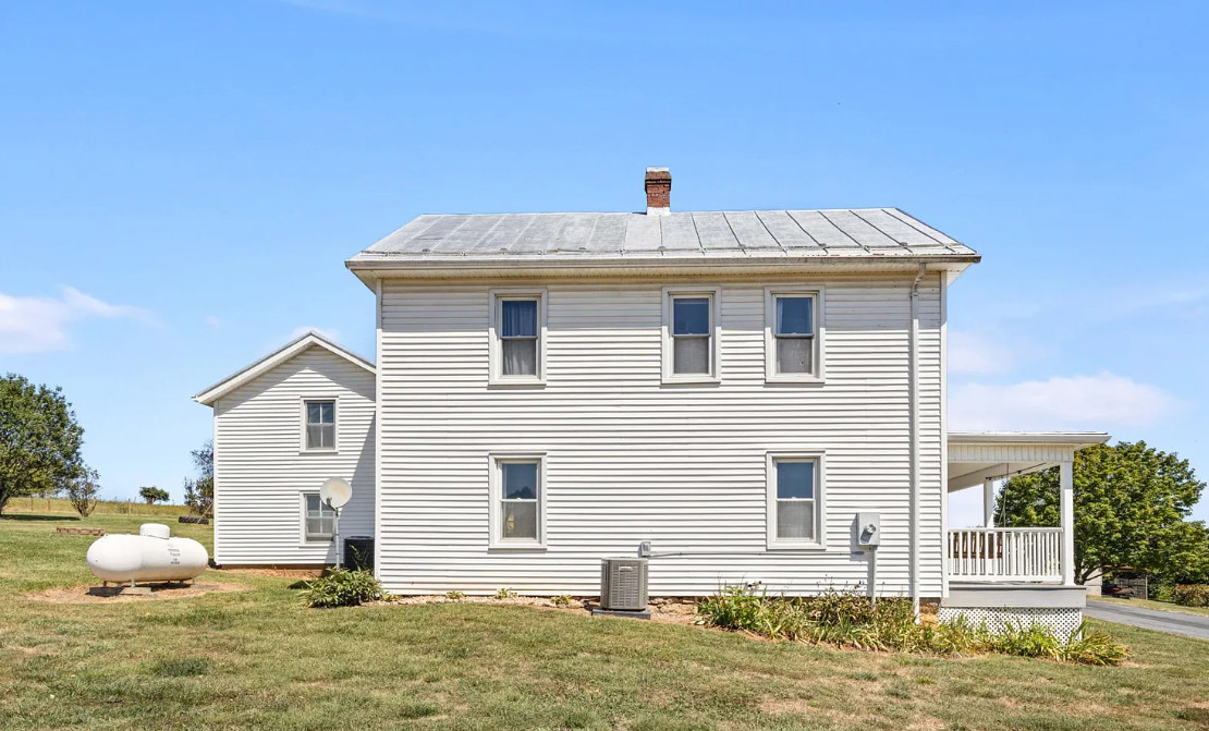 Pretty view and pretty house! Circa 1896. One acre in Virginia. $310,000