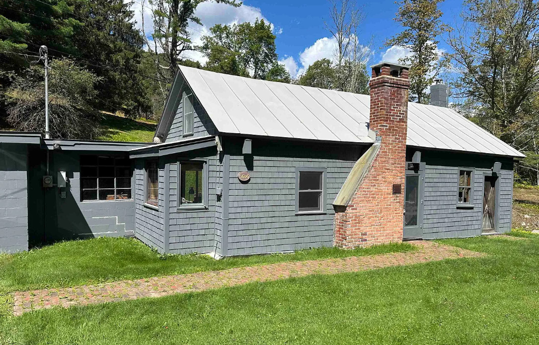 That setting! That interior! Nine acres in Vermont. $269,500