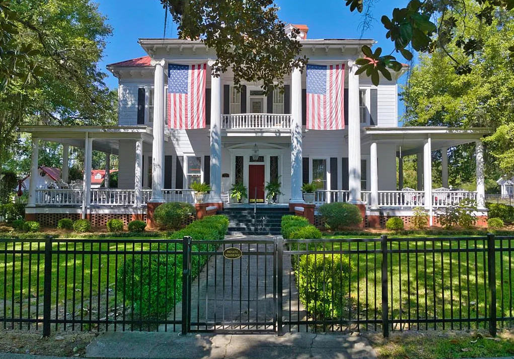 Beautiful exterior! Barber Tucker House, Circa 1904. Almost an acre in Georgia. $499,900