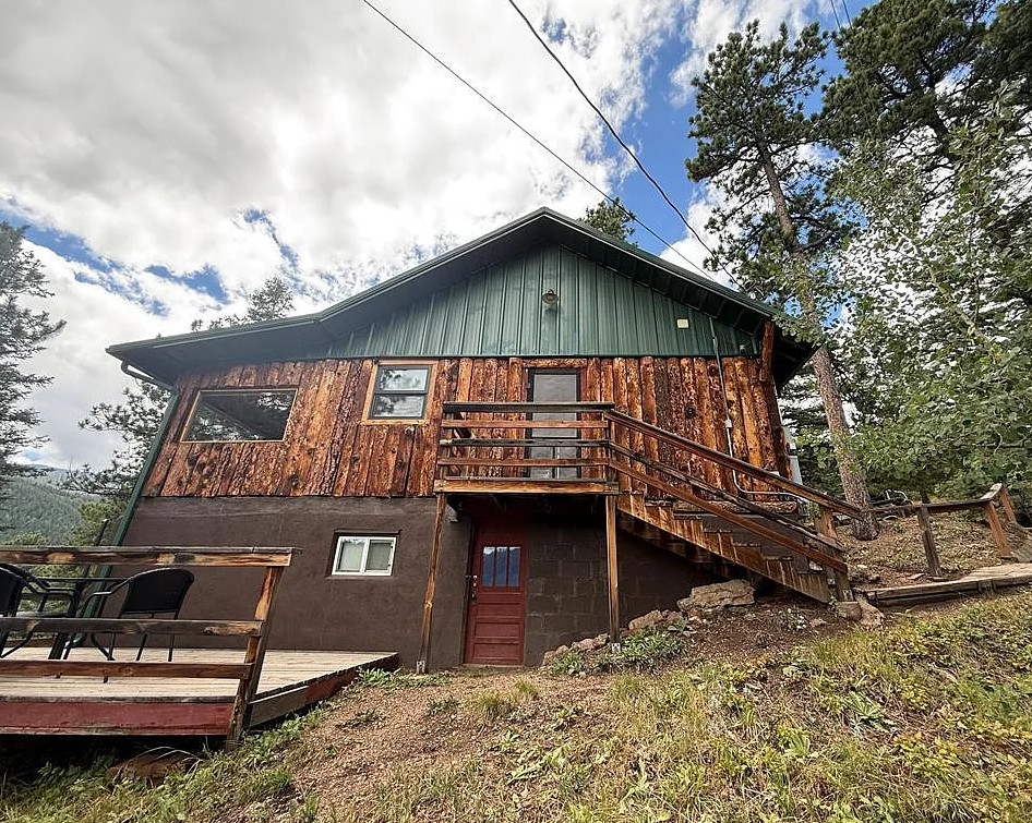 Colorado Cabin! Includes furniture, snow blower and kayaks. C. 1943. $349,000
