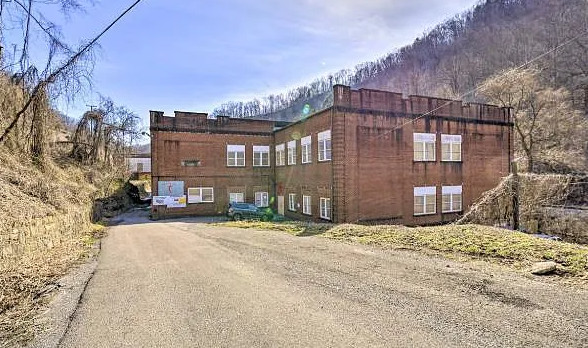 Nice opportunity! Former school and ATV Retreat. 60,000 sf! On four acres in WV. $299,900