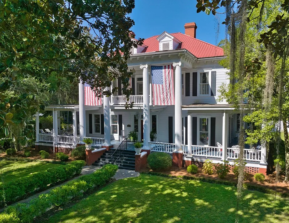 Beautiful exterior! Barber Tucker House, Circa 1904. Almost an acre in Georgia. $499,900