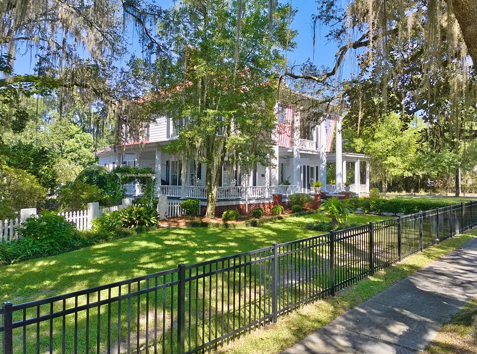 Beautiful exterior! Barber Tucker House, Circa 1904. Almost an acre in Georgia. $499,900