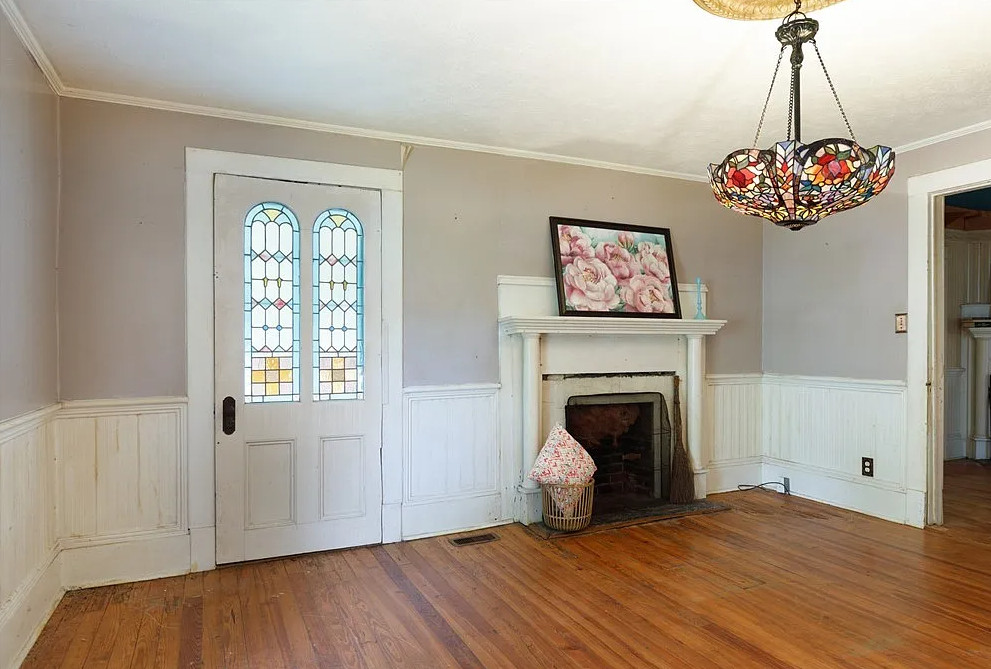 On 18 acres in North Carolina! Love the stained glass front door! $230,000