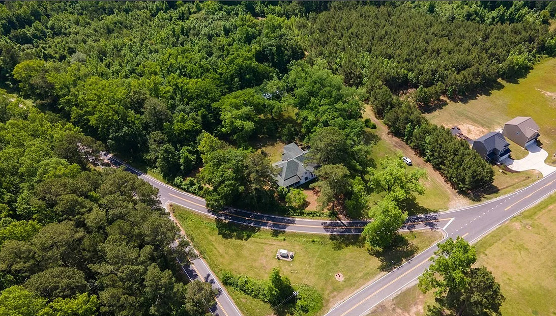 On 18 acres in North Carolina! Love the stained glass front door! $230,000