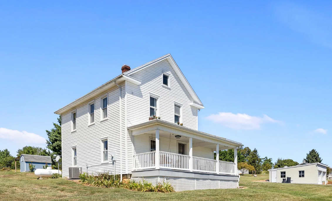 Pretty view and pretty house! Circa 1896. One acre in Virginia. $310,000