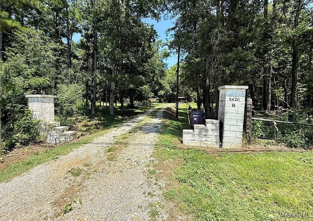 Pretty setting! On 20 acres in Alabama. Has a pond! $279,000