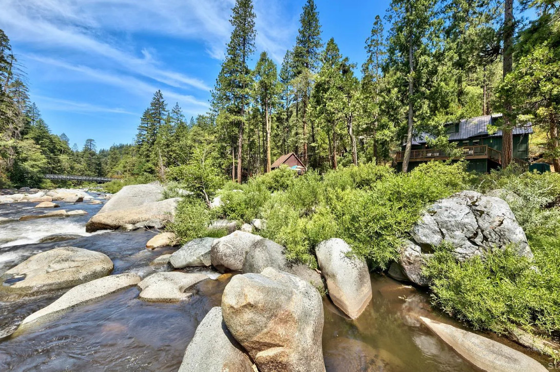 Pretty setting and cabin! Circa 1938 in California. $349,900
