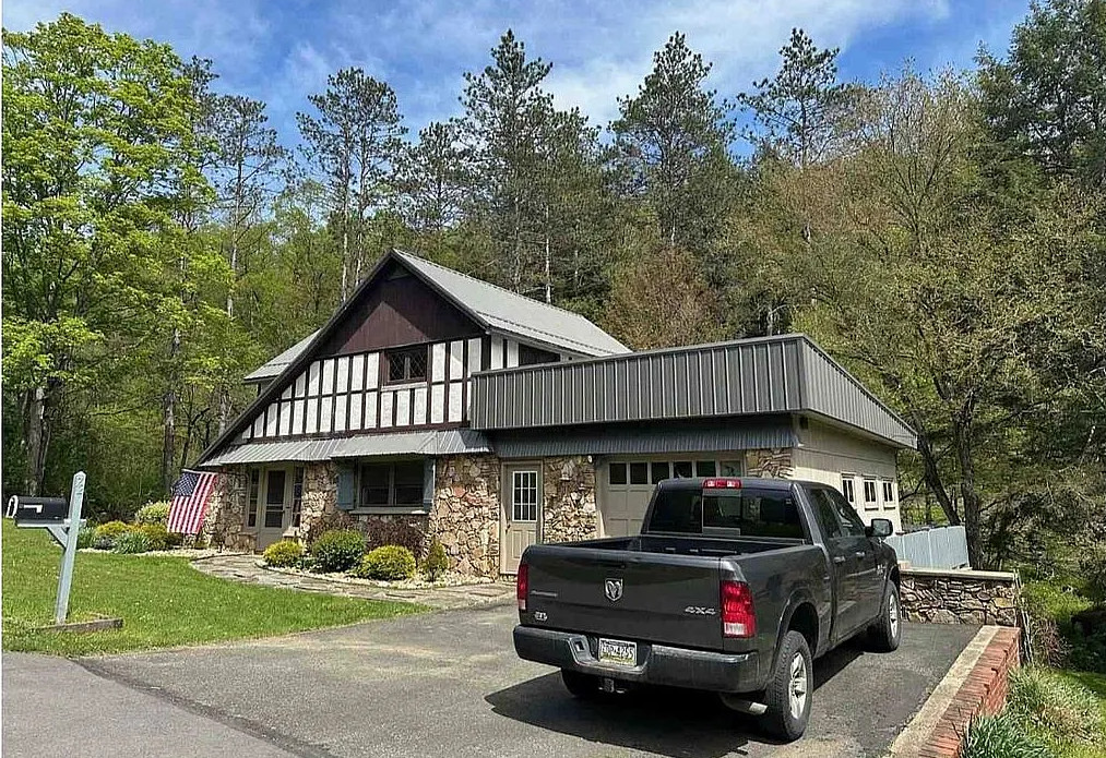 This Tudor style home is pretty! Circa 1920. Three acres in Pennsylvania. $275,000